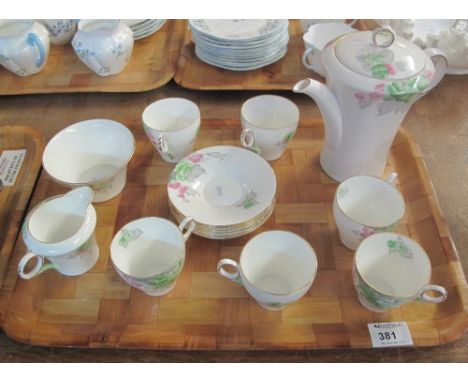 Tray of Shelley 'England' china tea service, registration no.: 781613, on a white ground with gilt banding and floral and fol