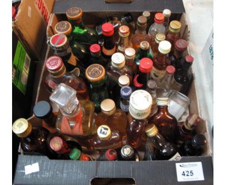 Tray of assorted alcoholic miniatures to include: Captain Morgan rum; Johnnie Walker Red Label Old Scotch Whisky; Teacher's S