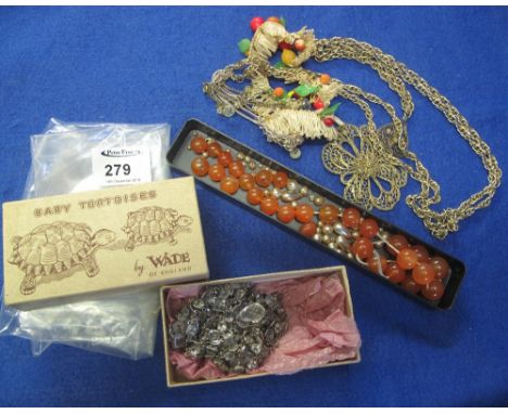 Box containing assorted amber coloured and pearl beads, loose and bag of assorted costume jewellery to include: pendants on c