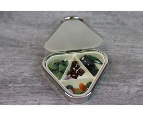 Pair of jade cufflinks together with a small quantity of loose gemstones to include Jade, garnet and amethyst