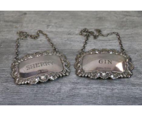 Silver decanter label engraved 'Gin' with traditional repousse shell and foliate border, makers A Marston &amp; Co, Birmingha