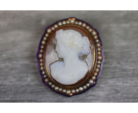 Victorian enamelled and pearl set carnelian cameo yellow metal brooch, the cameo depicting Grecian lady with vine leaves in h