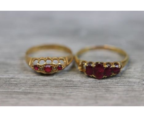 Victorian ruby unmarked yellow gold ring, four graduated oval mixed cut rubies (one ruby deficient) claw settings, ring size 