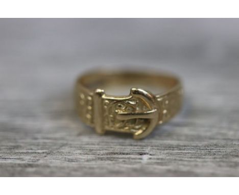 Victorian style 9ct yellow gold buckle ring, with foliate scroll decoration in relief to band, width at widest point approxim