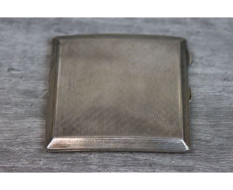 George V silver cigarette case of square form, engine turned decoration, gilt interior, engraved initials, makers Jay, Richar