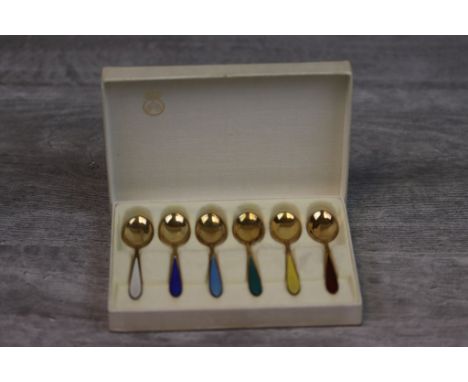 Six Scandinavian enamelled silver gilt coffee spoons, guilloche enamel stems, each in a different colourway, stamped 925 S St