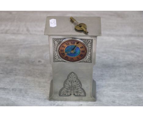 Archibald Knox for Liberty &amp; Co enamelled Tudric mantle clock, the coppered face with blue and green enamelled centre, na
