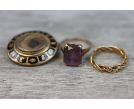 9ct yellow gold rope twist woven band, ring size S; an amethyst 9ct rose gold dress ring, ring size Q½ and a Victorian yellow