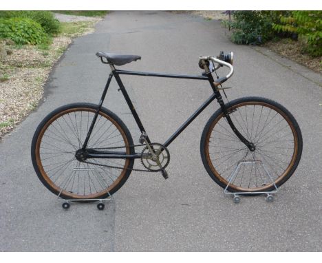 A Raleigh Path Racer,  having a  24-inch frame numbered 336680, with a black email finish (possibly original) with logos and 