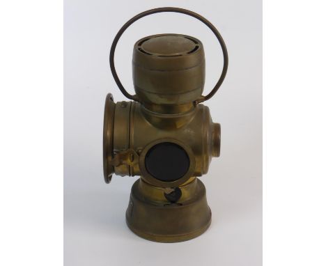 A Joseph Lucas, 630 Series Lamp.  A combination number plate and rear oil-powered lamp with correct oil reservoir, carrying b