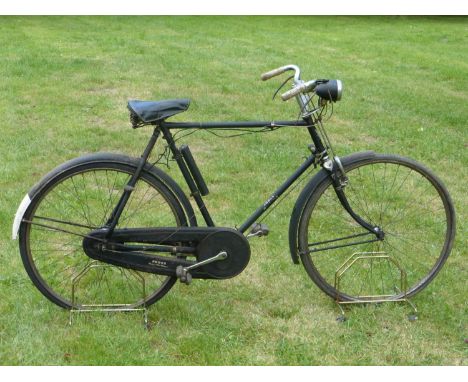 A 1950s Rudge Roadster  having a 24-inch frame, Sturmey Archer three-speed dynamo rear hub, electric lighting, chain case, st