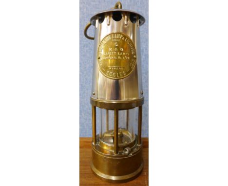 An Eccles Type 6 miners lamp and a Newstead Commemorative plate
