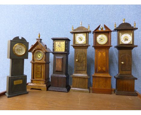 Six miniature longcase clock timepieces