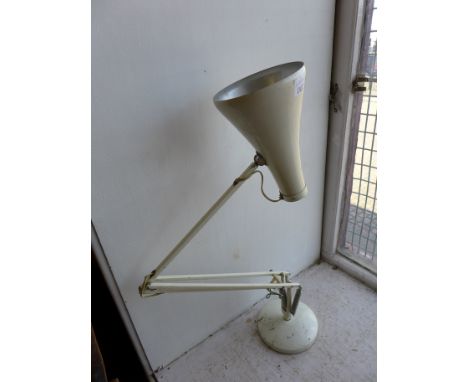 A white anglepoise lamp