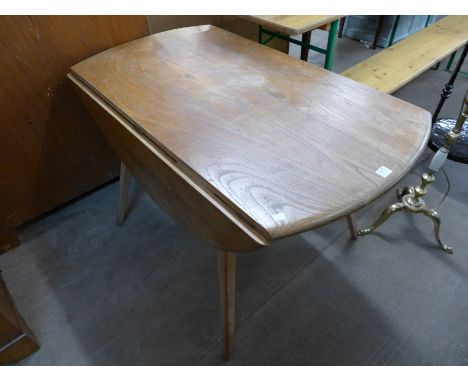 An Ercol drop-leaf table