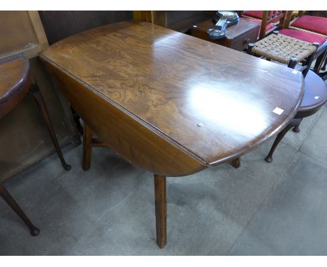 An Ercol drop leaf table