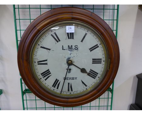 A 194th Century mahogany circular wall clock, the painted dial inscribed LMS Derby
