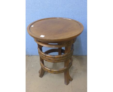 A mahogany faux bamboo occasional table, tapestries and prints