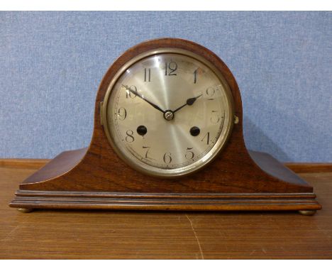 An oak mantel clock