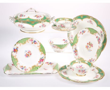 A PART PARAGON CHINA ROCKINGHAM PATTERN DINNER SERVICE, decorated with Chinese pheasants amongst flowers comprising three din