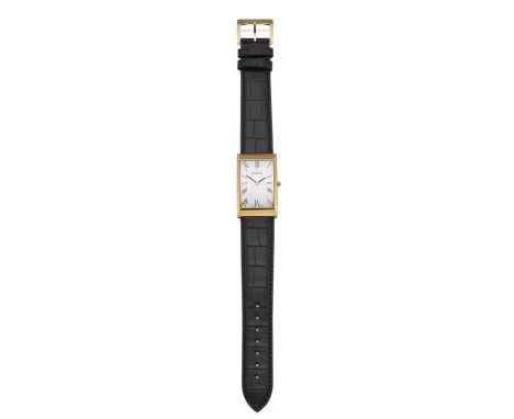 A GENTS MICHEL HERBELIN STRAP WATCH. Rectangular silver dial with black roman index and hands, yellow PVD curved case measuri
