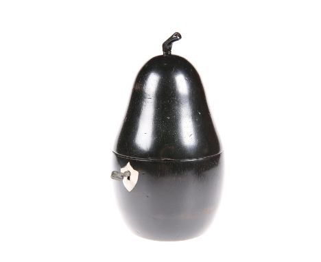 AN EBONISED PEAR-SHAPED TEA CADDY, with key. 17cm highThe absence of a Condition Report does not imply that a lot is without 