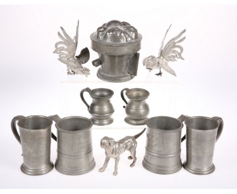A VICTORIAN PEWTER THREE SECTION JELLY MOULD, with fruit top and lattice body, 15cm high; TWO VICTORIAN PEWTER PINT MUGS; TWO