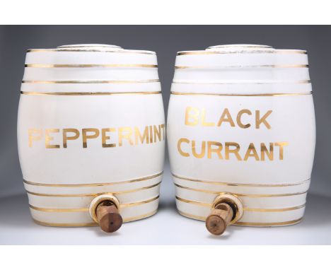 TWO POTTERY BARRELS,&nbsp;the first labelled blackcurrant, the second peppermint, early 20th Century. Approximately 27cm high
