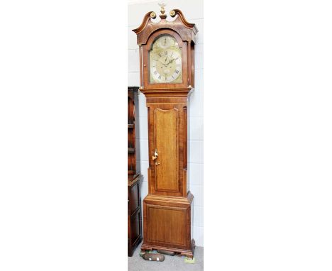 An Oak and Mahogany Eight-Day Longcase Clock, 12" arch brass dial with a Roman and Arabic silvered chapter ring, with matin d