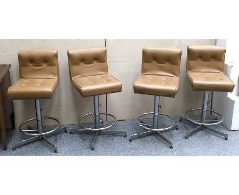 A Set of Four Leather Bar Stools with Button Backs and Seats with Chrome Supporting Bases