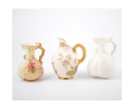Royal Worcester jug, ivory ground, No.1094, hand-painted with flowers, 13cm; coral handled jug, No.1507, similarly decorated;