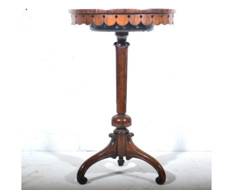 William IV rosewood jardiniere table, circular top with shaped apron, carved tapering column, raised on scrolled tripod suppo