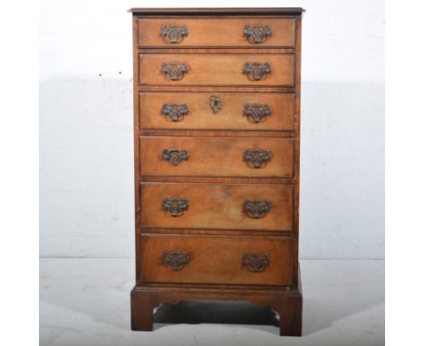 Reproduction walnut chest of drawers, of narrow proportions, with six drawers, on bracket feet, W48cm x D39cm x H90cm.