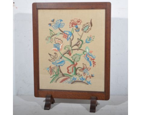 1930s oak framed firescreen, inset with needlework panel W54cm x H72cm.