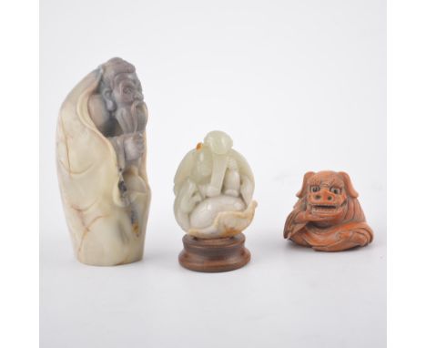 Small Jade carving, stained wood plinth, 7cm in total; carved wood netsuke; two character inset plaque; and a soapstone carvi