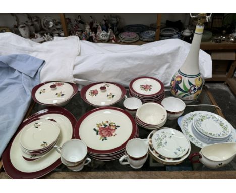 A Wedgwood Barlaston Rose pattern part dinner set together with a Poole pottery table lamp, Shelley saucers etc