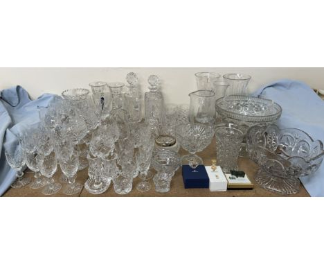 Swarovski miniature basket of flowers together with a Swarovski timer, Verdite hippopotamus, crystal decanters, drinking glas