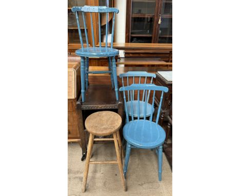 A set of three blue painted stick back kitchen chairs together with a stool and an oak tea trolley