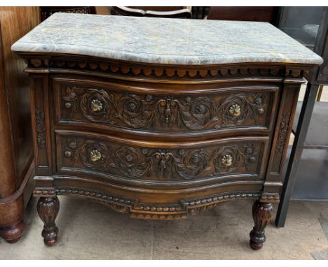 A reproduction marble topped commode with a serpentine top above two drawers on carved tapering legs, 97cm wide x 51cm deep x