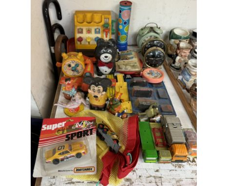 A Big Ben Repeater alarm clock together with other alarm clocks and assorted toys 