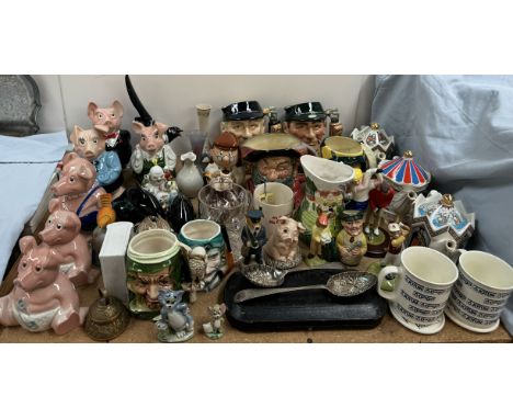 Six assorted Wade NatWest piggie boxes together with Royal Doulton character jugs, Poole pottery dolphins, USSR magpie, novel