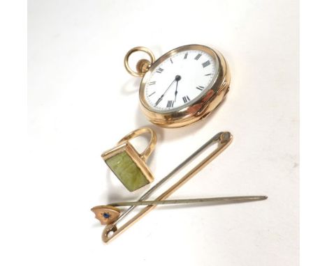 A 19ct yellow gold bar brooch, stick pin and dressing ring, together with a gold plated open faced fob watch (4)