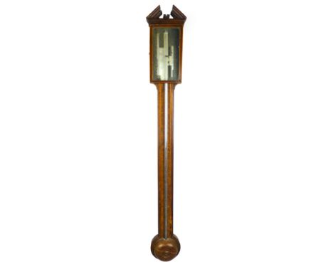 A George III mahogany boxwood line inlaid stick barometer with engraved silvered dial signed F Cremoneno over a turned cister