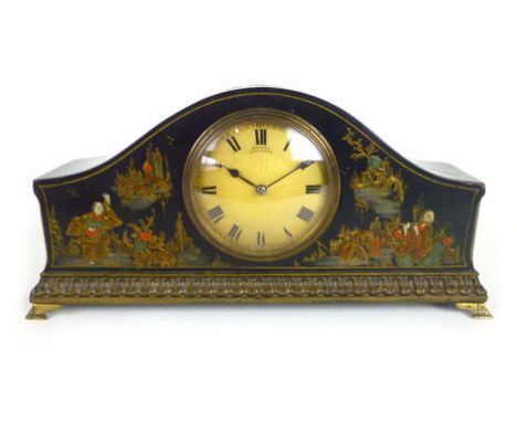 A late 19th century Chinoiserie mantle clock by Swinden of Birmingham the engine turned face with Roman numerals and a French