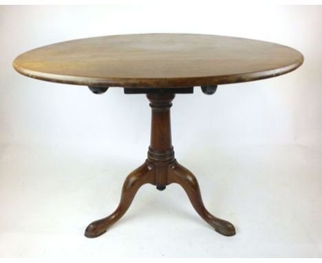 A mid Georgian mahogany tilt top tripod table, the top over turned column on three splay feet. h. 72.5 cm, dia 92 cm  CONDITI