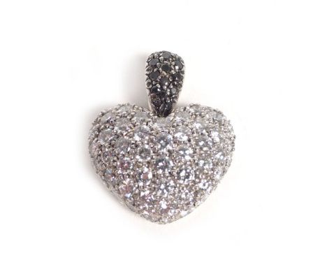 An 18ct white gold heart shaped pendant by Chopard, the heart pave set diamonds, the loop set black diamonds. w. 1.8 cm, 4.7 