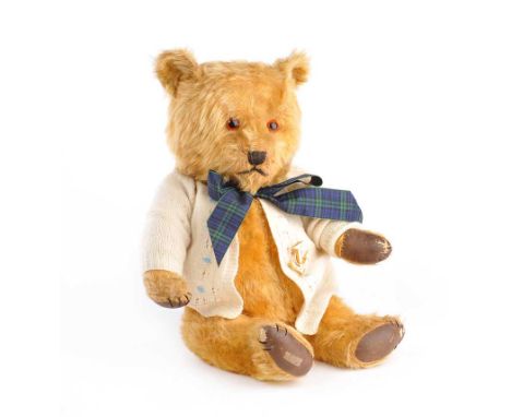 1950'S TEDDY BEAR, WITH LEATHER PADS & TRADITIONALLY FILLED WITH STRAW.HEIGHT: 19 INCHES.SLIGHT WEAR MARKS TO FACE.