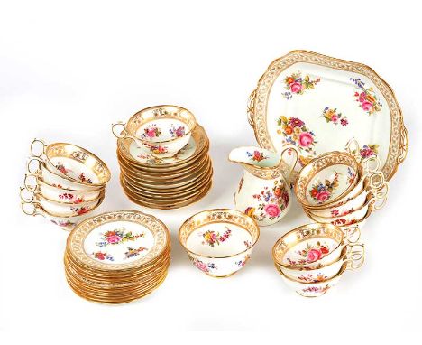 THIRTY-NINE PIECE HAMMERSLY CHINA TEA SET WITH GILT BORDERS & DECORATED WITH PAINTED FLOWERS.  SET INLCUDES: TWELVE CUPS, SAU