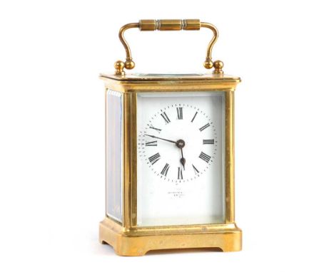 BRASS CARRIAGE CLOCK WITH SWING HANDLE, MAPPIN & WEBB, LONDON, IN A FITTED WOODEN CASE.HEIGHT: 4.5 INCHES, WIDTH: 3 INCHES, D