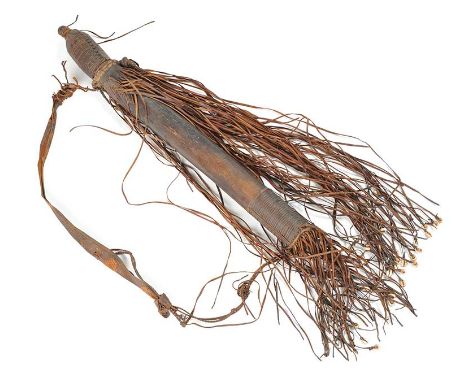 LEATHER ARROW CASE WITH SEVEN ARROWS, CASE BOUND WITH LEATHER TASSELS & SHELLS.LENGTH: 26 INCHES.NO OBVIOUS DEFECTS. 